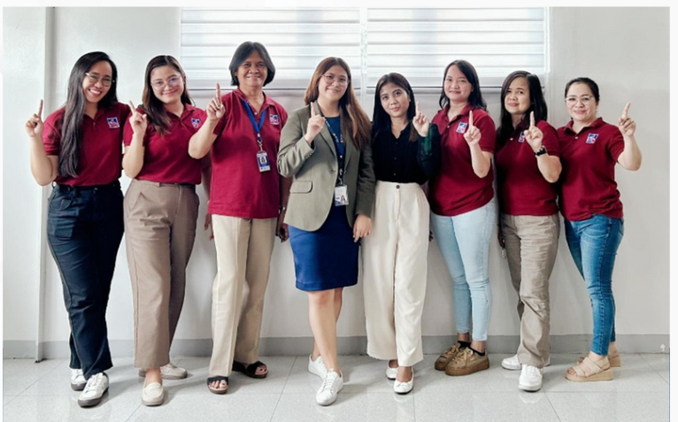 Associate Auditors Ashley Marie Rances and Kristel Anne Ballaran (center)  with Rural Bank of Solano (N.V.) Inc. personnel